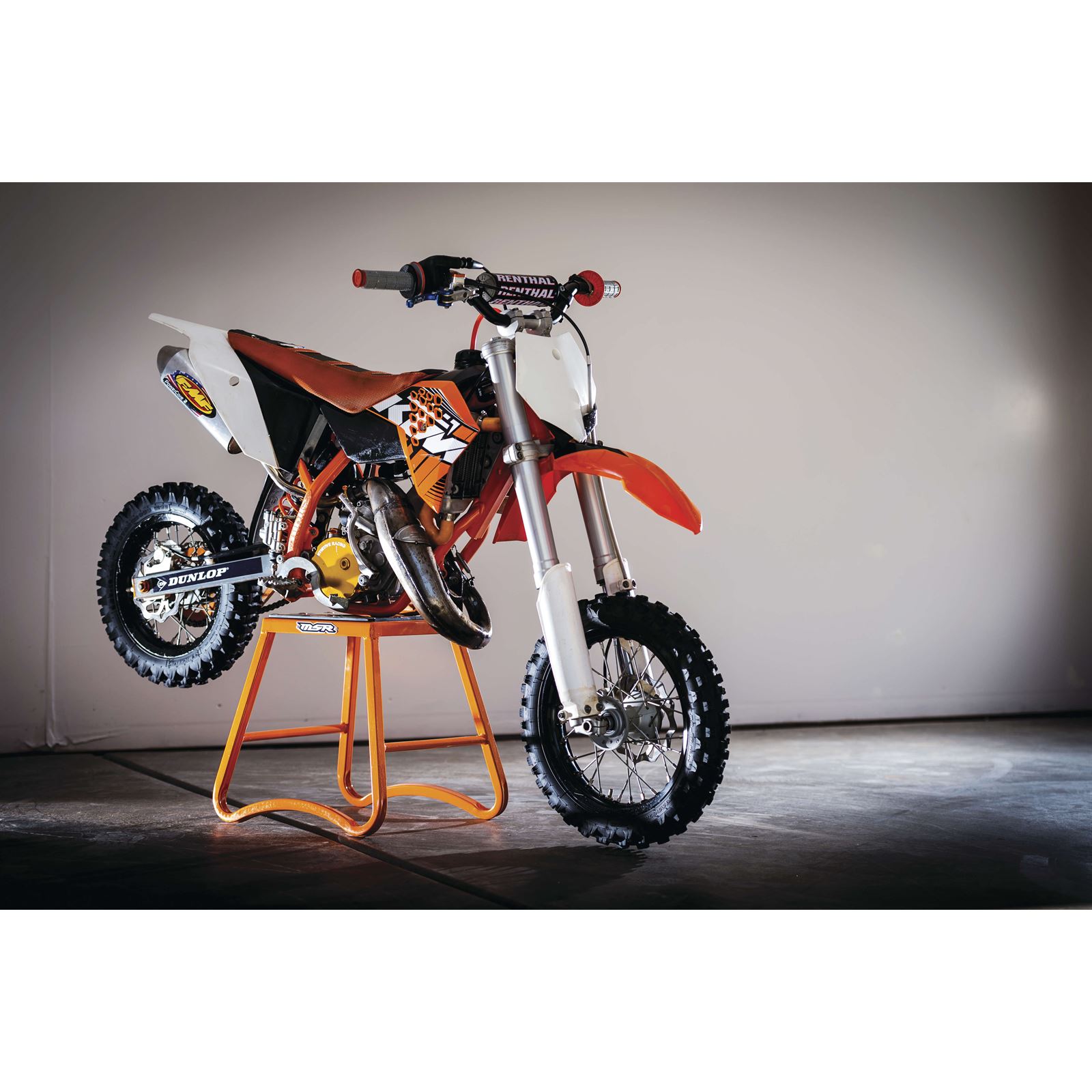 Motorsport Products Stand Mini SX1™ - Orange is at Motomentum at a